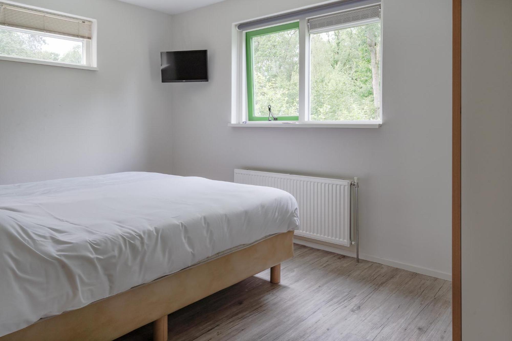 Rcn Vakantiepark De Roggeberg Апелсха Стая снимка